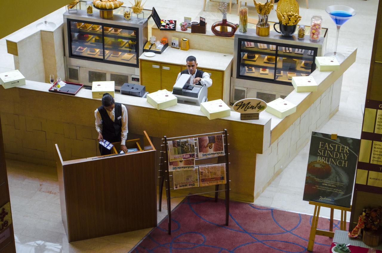 Radisson Blu Hotel, Грейтър Нойда Екстериор снимка Concierge desk at the Taj Mahal Palace, Mumbai, India